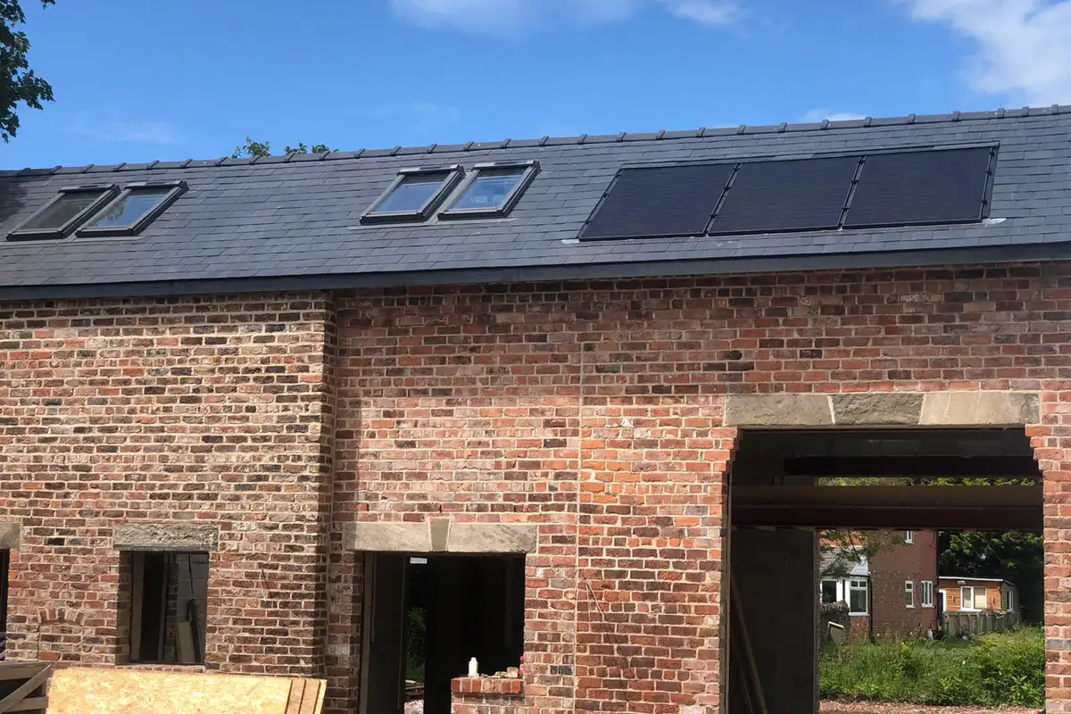 KSB Roofing Solutions working on a roof in Preston